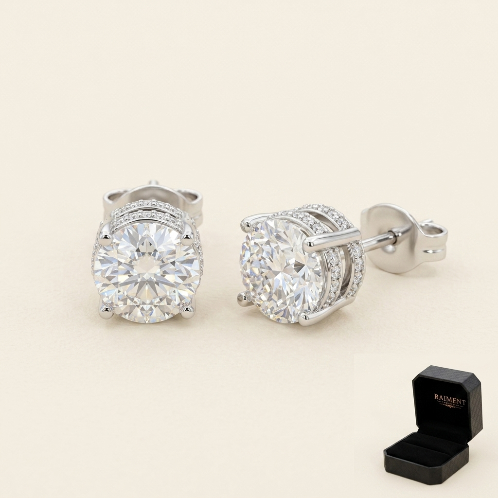 Moissanite crown-set stud earrings on cream background, Raiment Jewelry & Co.
