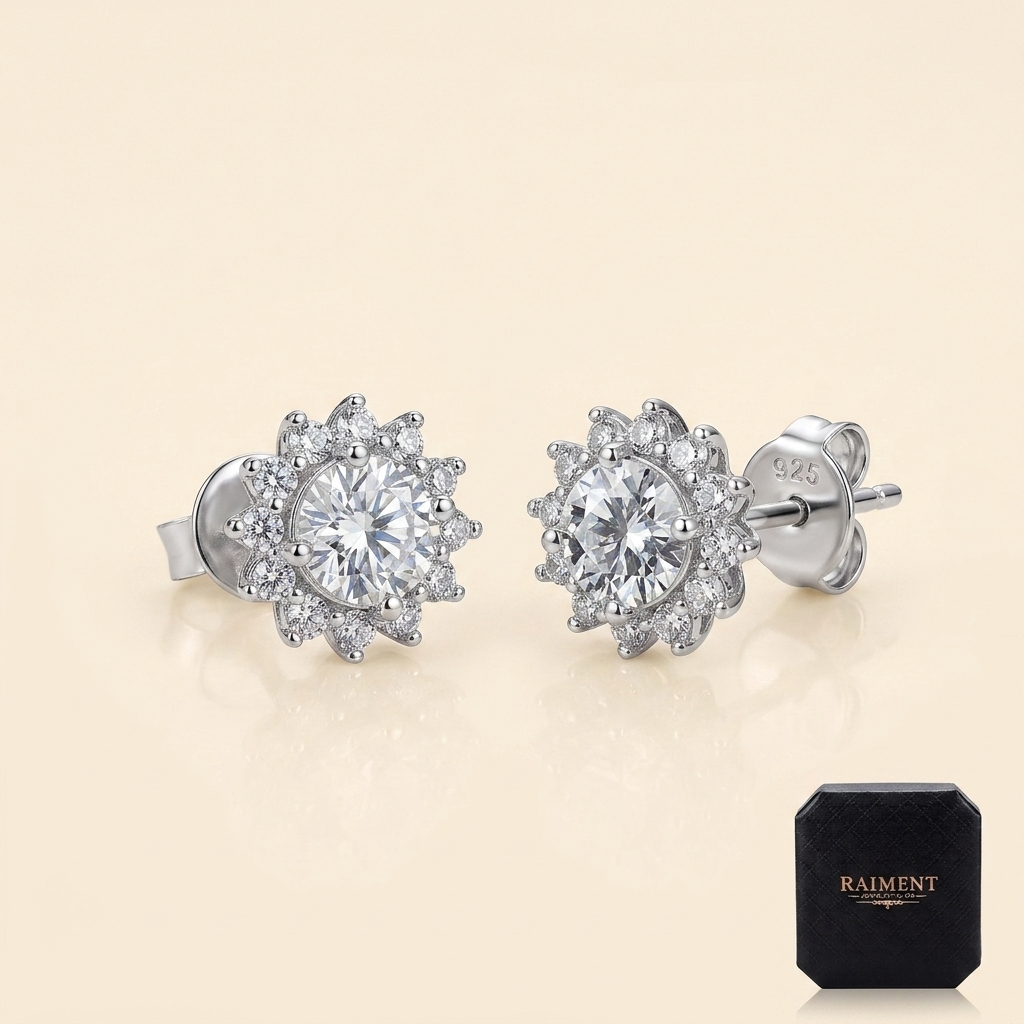 Moissanite 0.50ct round solitaire stud earrings on cream background, Raiment Jewelry & Co.