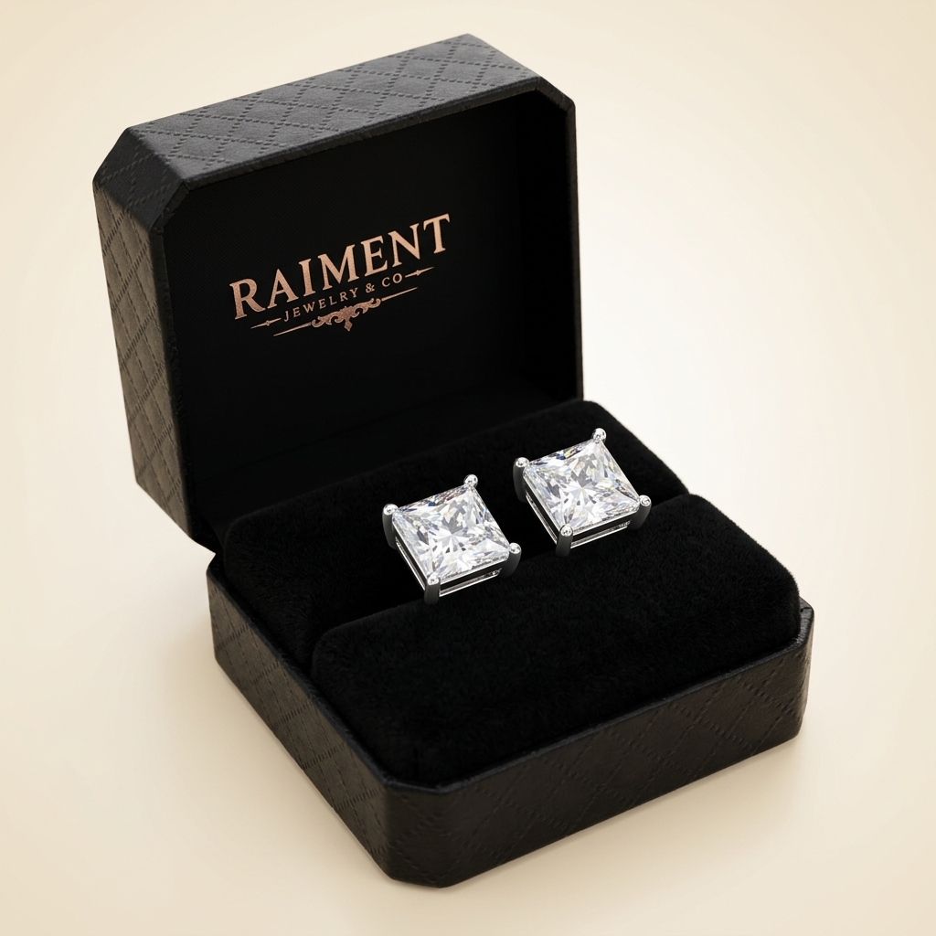 Moissanite princess-cut stud earrings inside open jewelry box, Raiment Jewelry & Co.