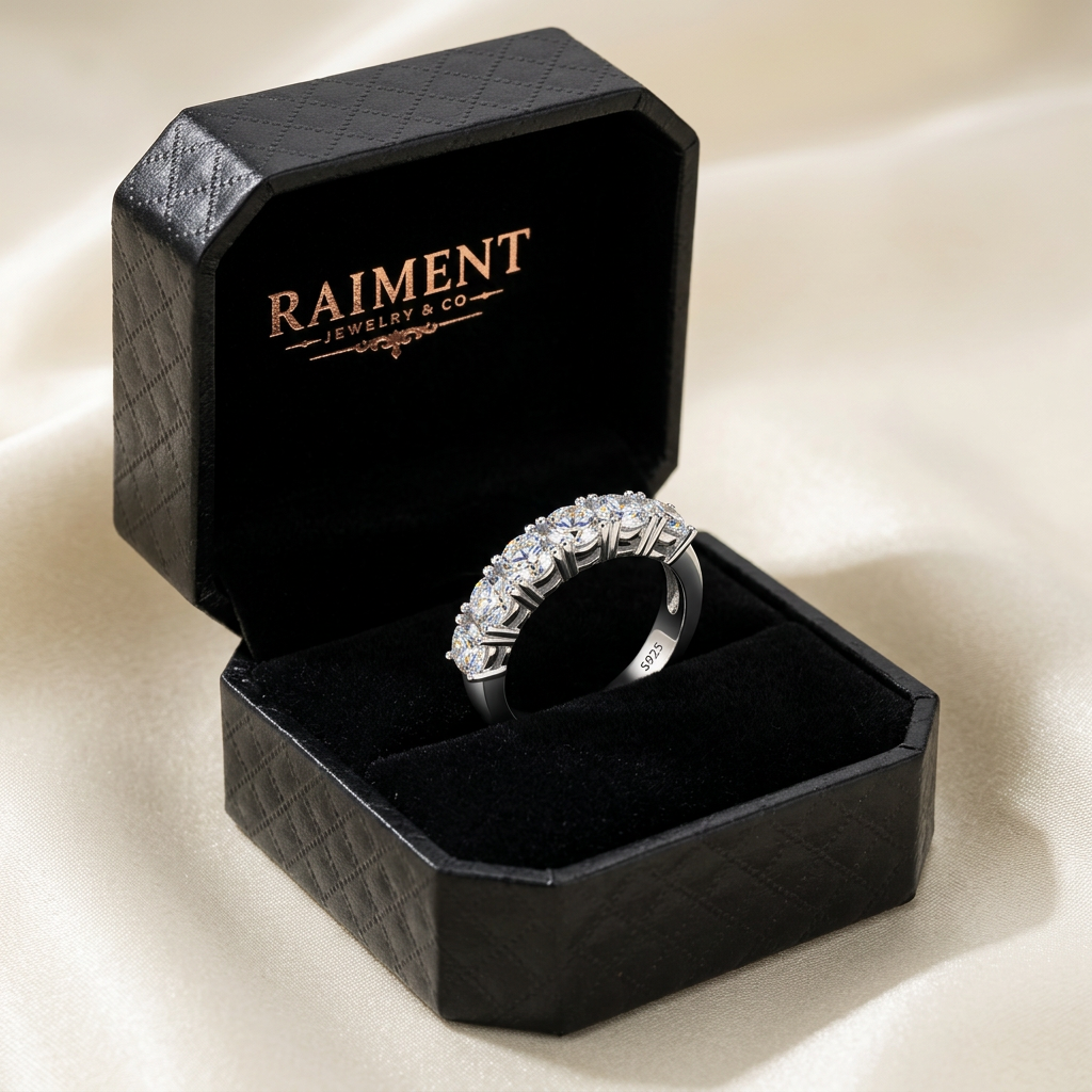 Men's moissanite channel-set ring inside open jewelry box, Raiment Jewelry & Co.