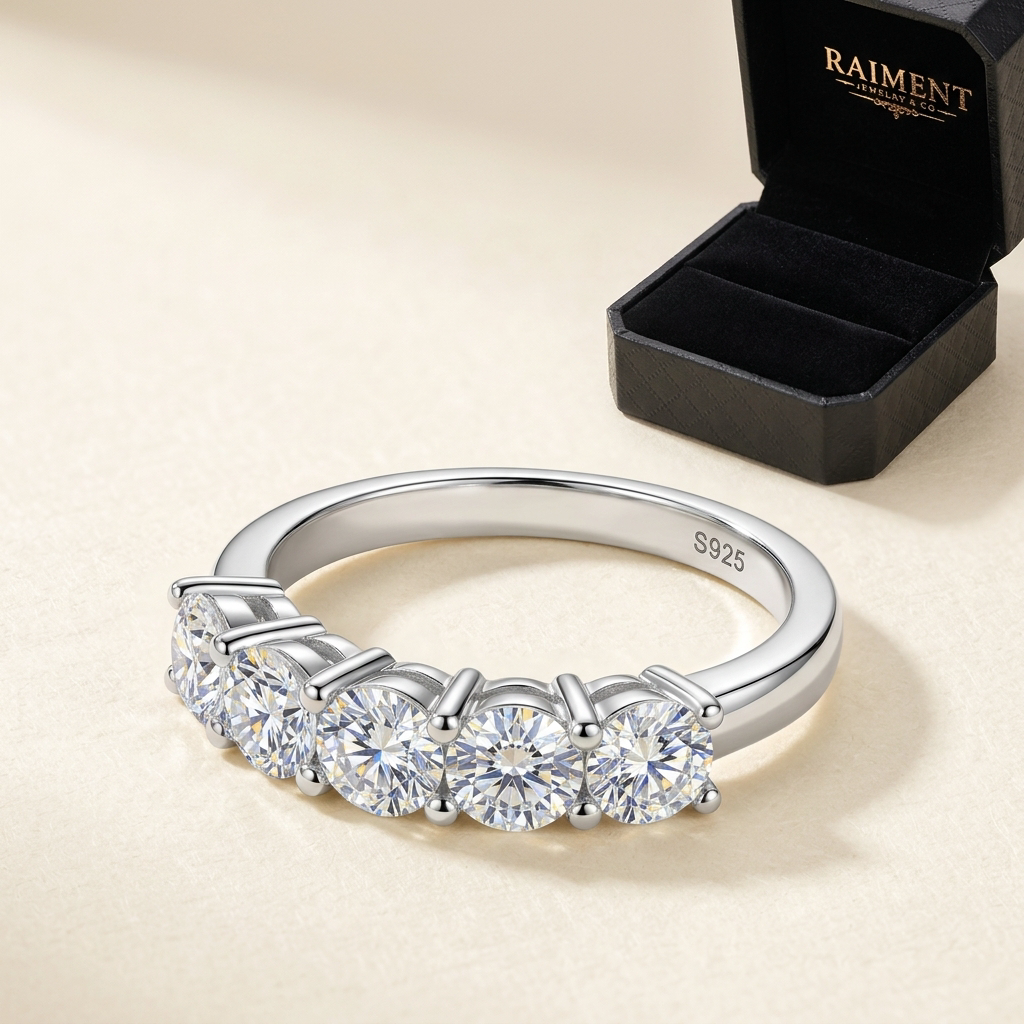 Men's moissanite channel-set ring on cream background, Raiment Jewelry & Co.