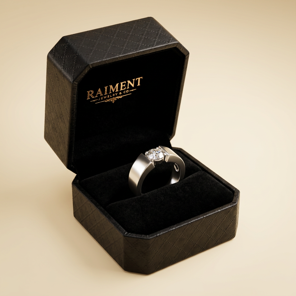 Men's moissanite minimalist ring inside open jewelry box, Raiment Jewelry & Co.