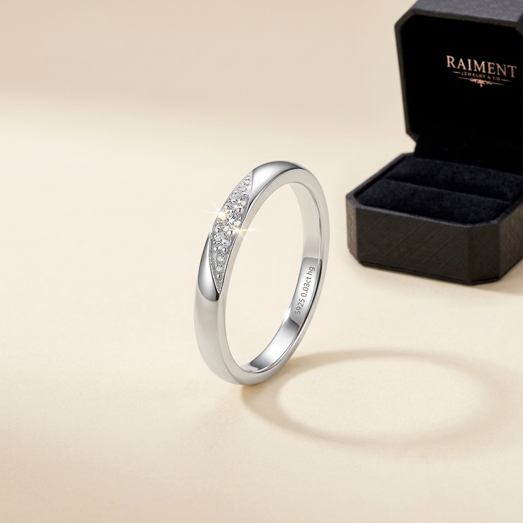 Moissanite trio cluster ring on cream background, Raiment Jewelry & Co.