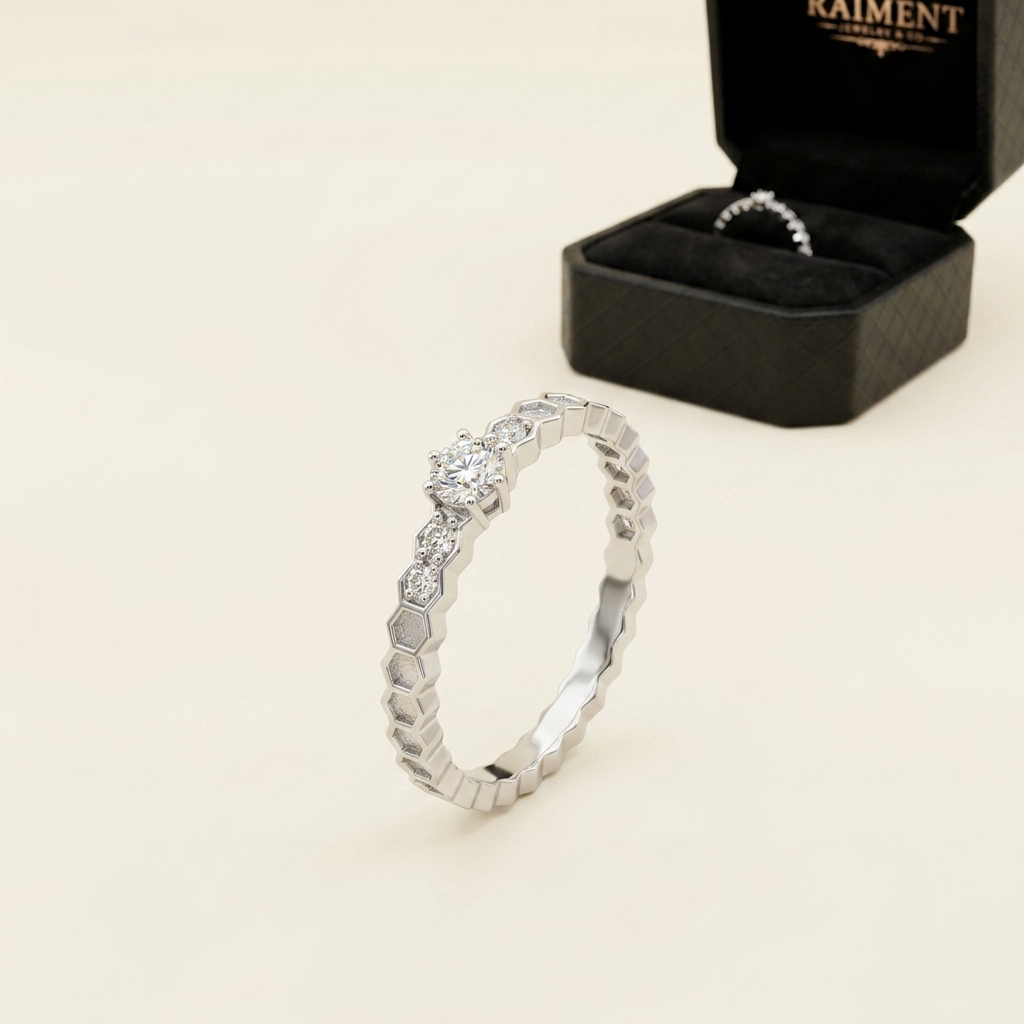 Moissanite honeycomb band ring on cream background, Raiment Jewelry & Co.