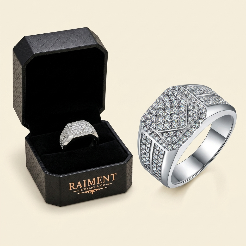 Raiment Jewelry & Co. moissanite vine ring beside open jewelry box on cream background