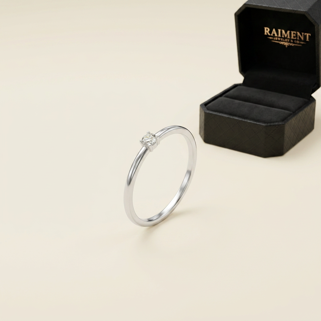 Moissanite accent band ring on cream background, Raiment Jewelry & Co.