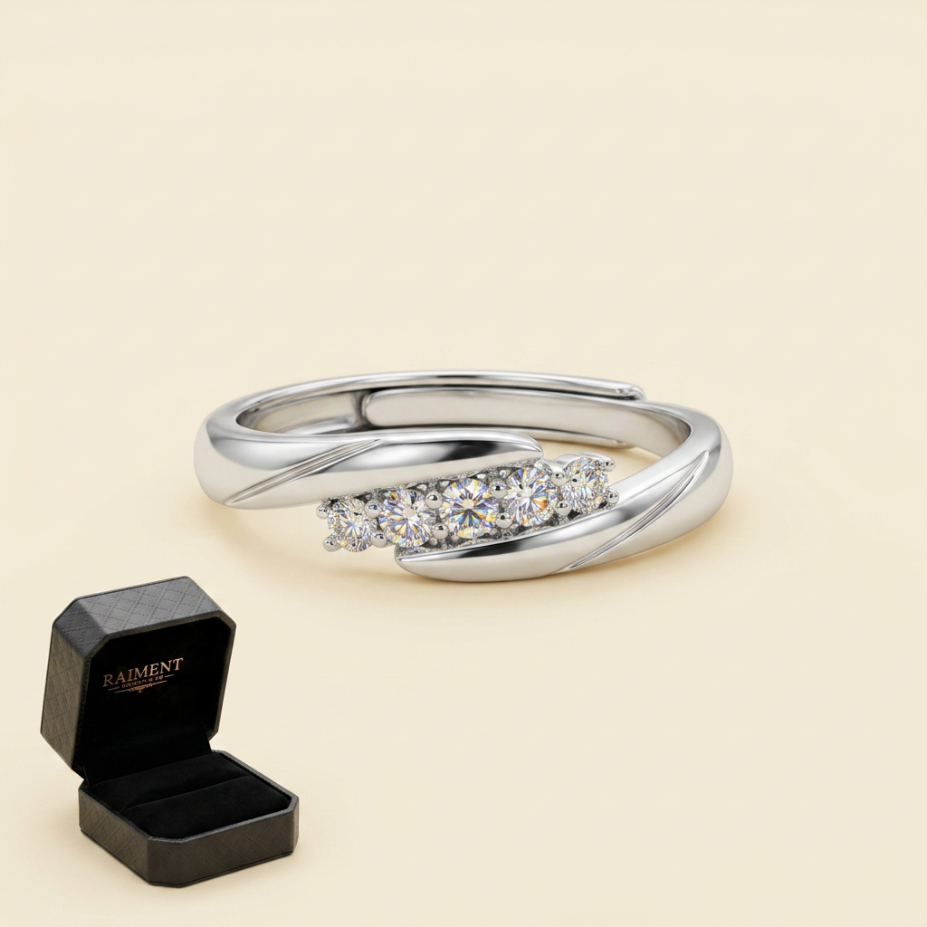 Moissanite five-stone ring on cream background, Raiment Jewelry & Co.