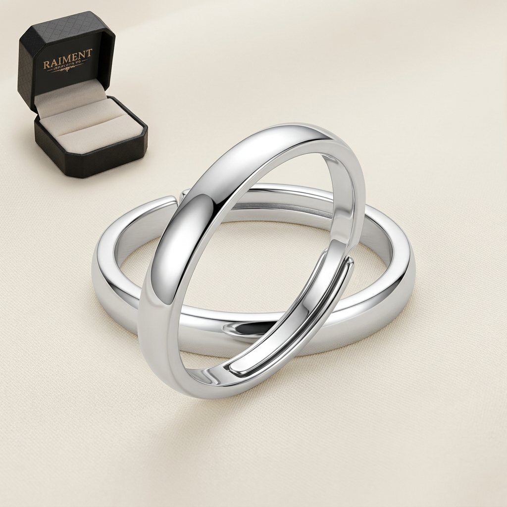 Men's polished band ring on cream background, Raiment Jewelry & Co.