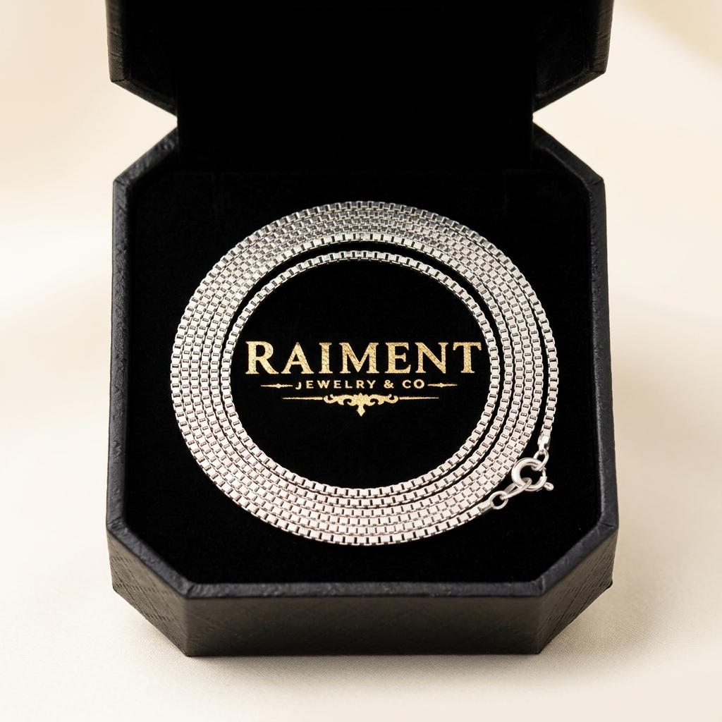 Sterling silver box chain inside open jewelry box, Raiment Jewelry & Co.