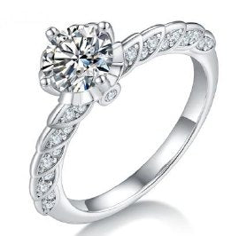 Moissanite 4-Claw Accented Ring